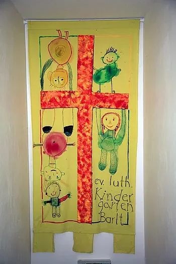 Kinderbild stellt Träger der Kita Barlt dar.